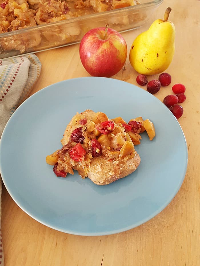 Crock-Pot Cran-Apple Pear Pork Chops - Here’s a new way to bring some flavor to those pork chops! The perfect mixture of sweet, tart and spice!