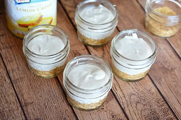 This no bake lemon cheesecake in mini mason jars would be a great dessert or a bridal or baby shower.